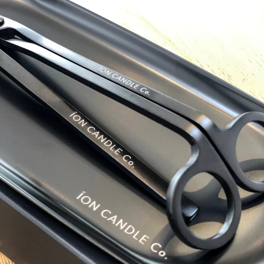 Ion Candle Co. - Close up image of candle snuffer tool
