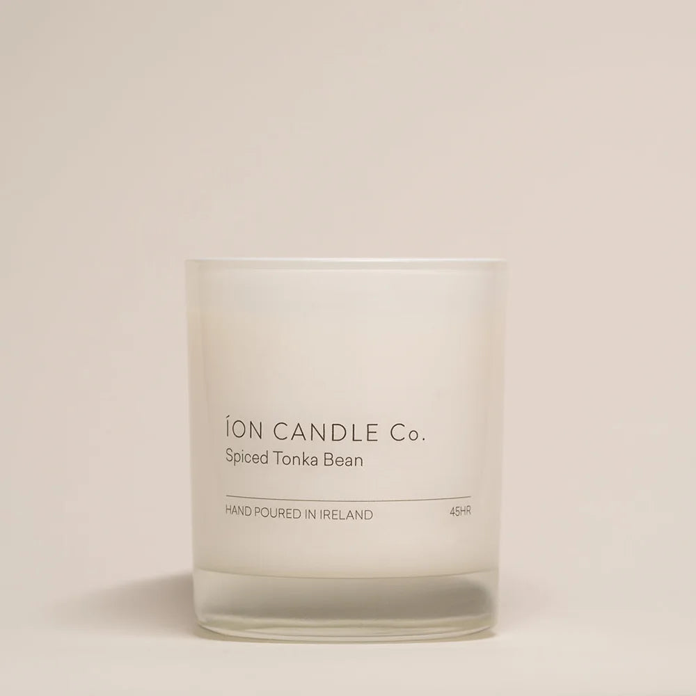 Ion Candle Co. - Luxury scented spiced tonka bean candle against a beige background - 45 hours burn time