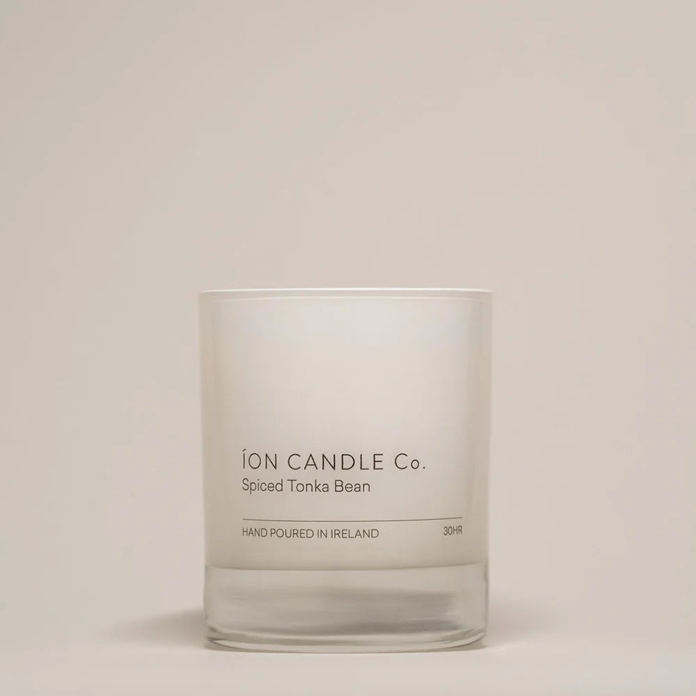 Ion Candle Co. - Luxury scented spiced tonka bean candle against a beige background - 30 hours burn time