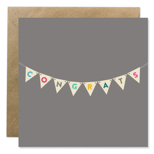 Ion Candle Co. - Congrats Greeting Card. The card is Grey with a hanging banner on the front that says Congrats.
