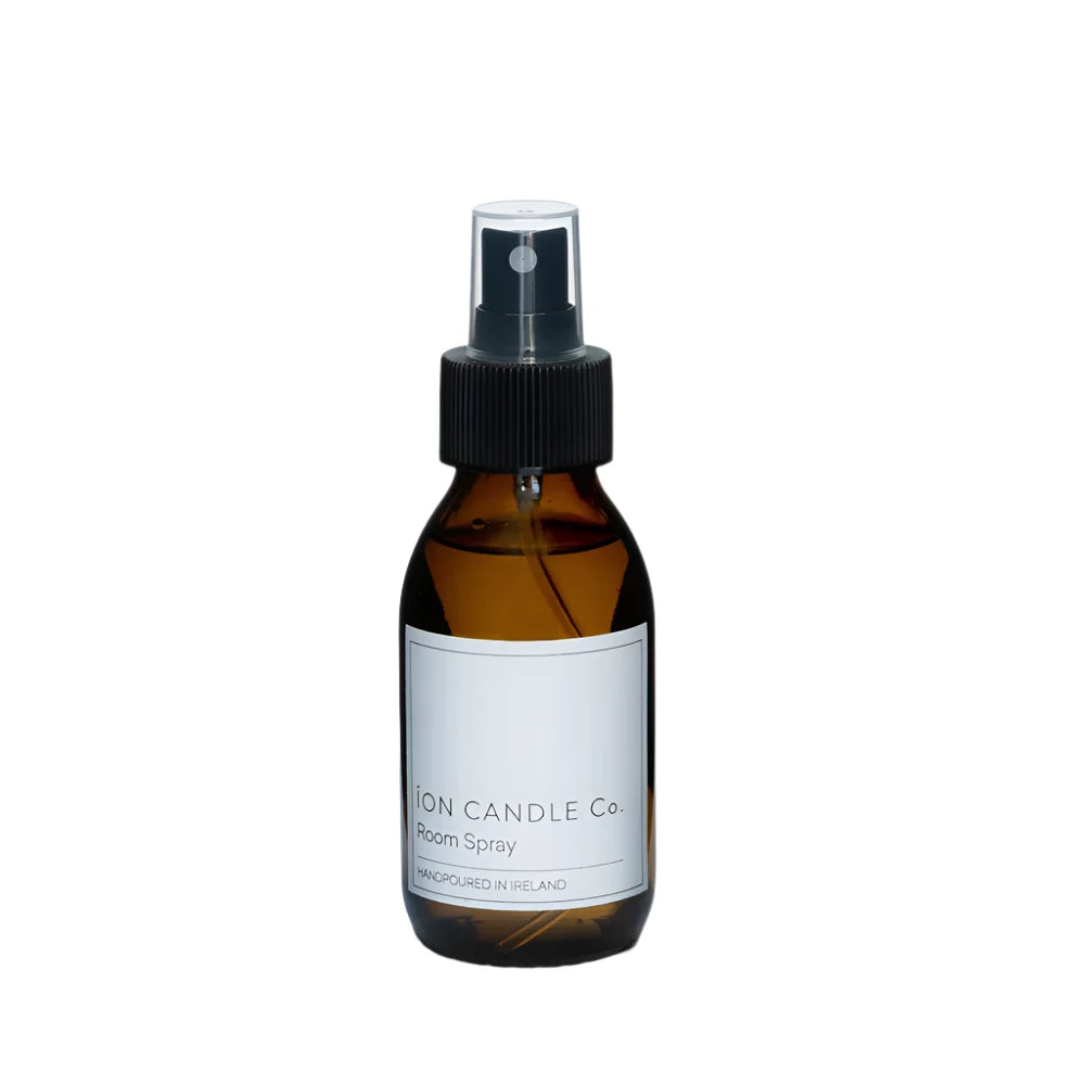 Ion Candle Co. - Luxury Scented Room Spray 100ml bottle against a white background. The bottle is brown and transparent with a white label and black text.