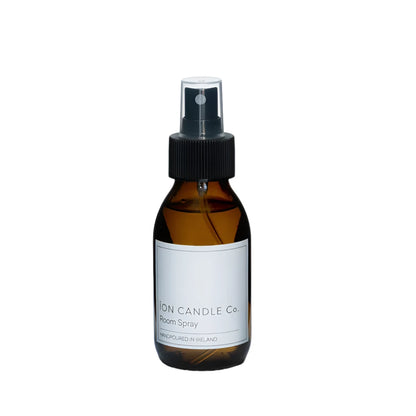 Ion Candle Co. - Luxury Scented Room Spray 100ml bottle against a white background. The bottle is brown and transparent with a white label and black text.