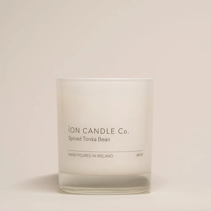 Ion Candle Co. - Luxury scented spiced tonka bean candle against a beige background - 45 hours burn time