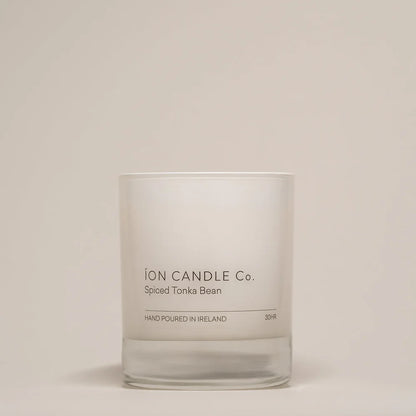 Ion Candle Co. - Luxury scented spiced tonka bean candle against a beige background - 30 hours burn time