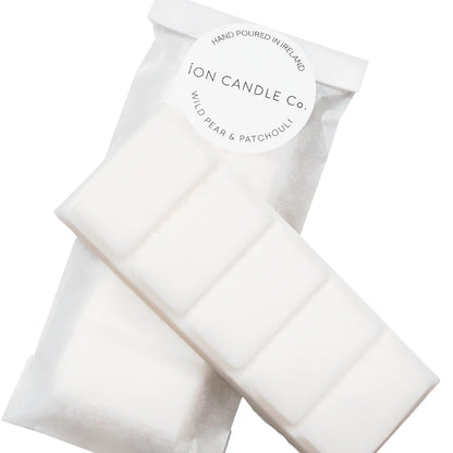 Ion Candle Co. - Wild pear and patchouli luxury scented wax melts in their packaging against a white background