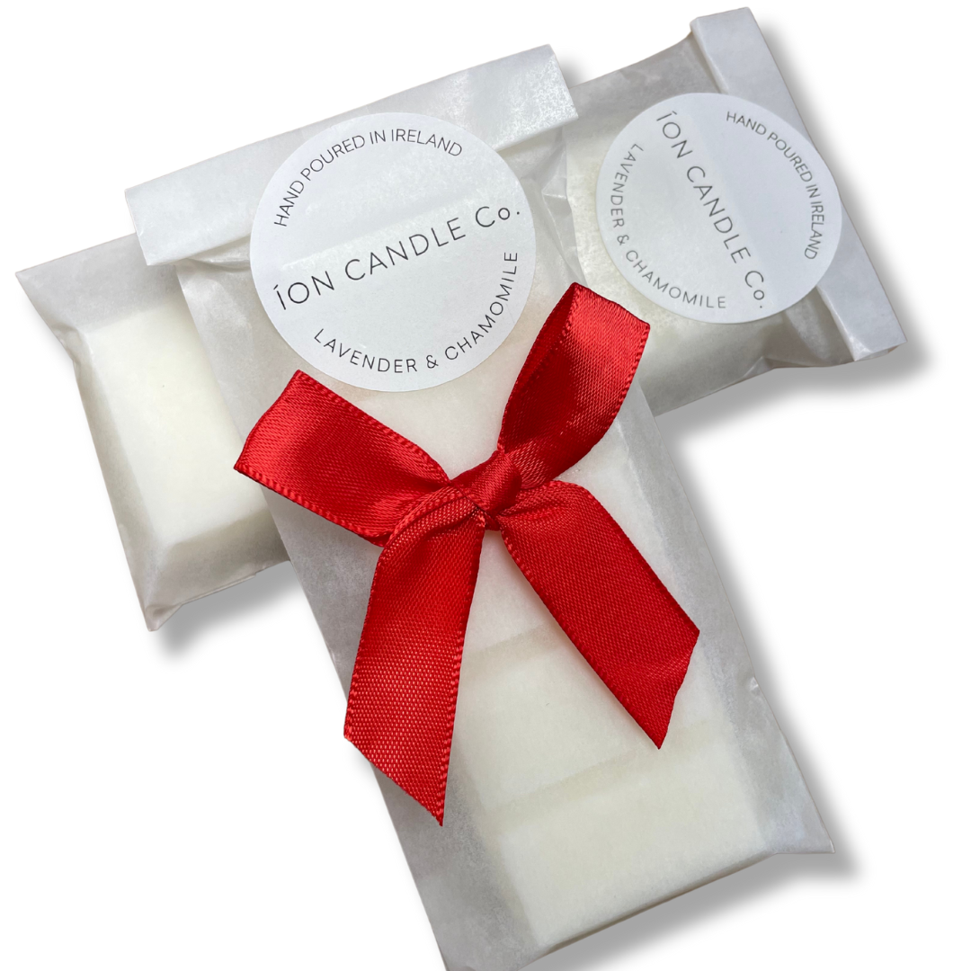 Lavender & Chamomile, Vanilla notes in a biodegradable glassine bag with red bow. 