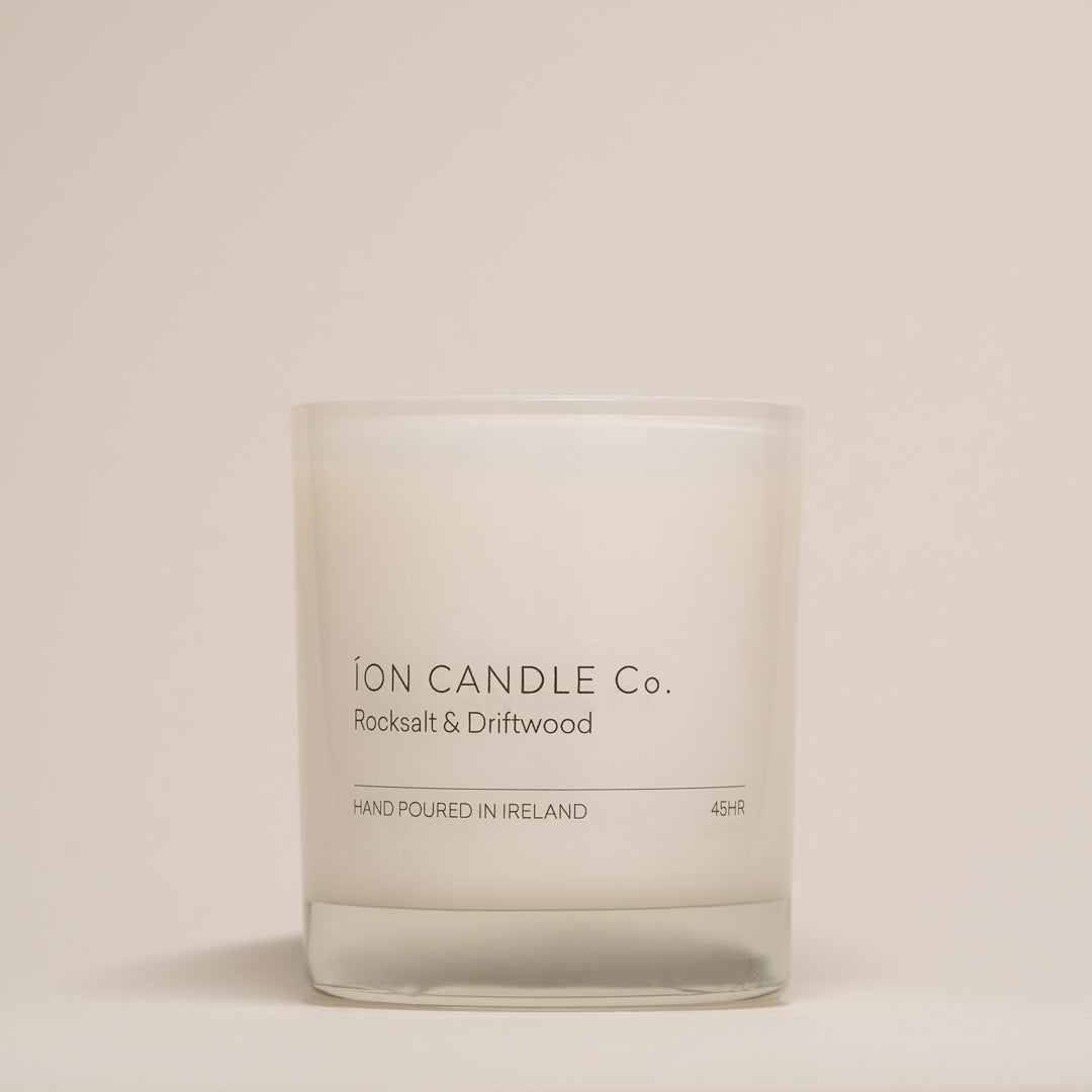 Ion Candle Co. - luxury scented rocksalt & driftwood candle against a beige background - 45 hours burn time