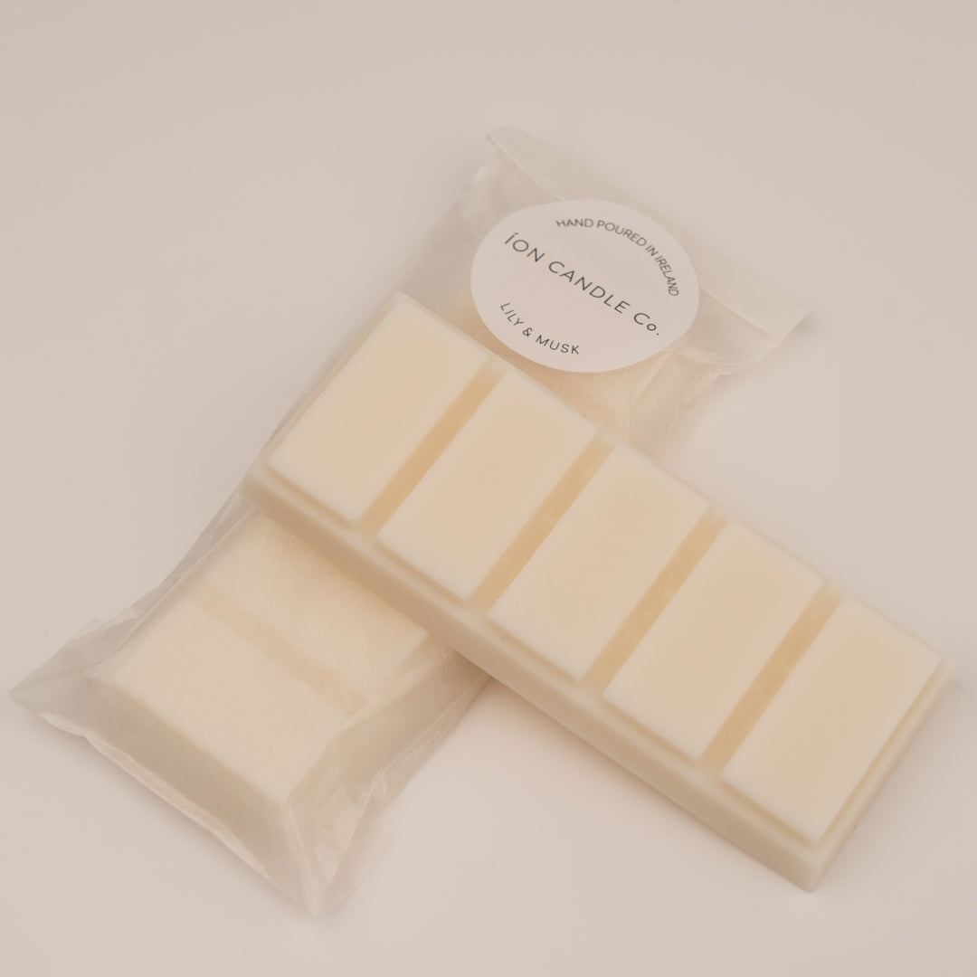 Luxury scented Lily & musk wax melts on a white background